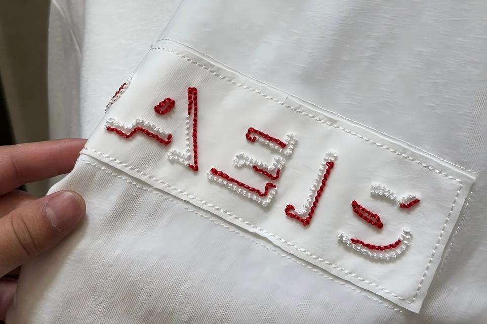 Denim tears puff print embroidery detail