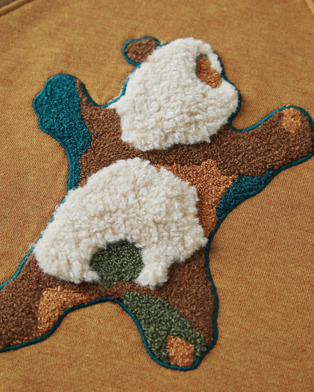 Rhinestone cowboy style menswear embellishment detail